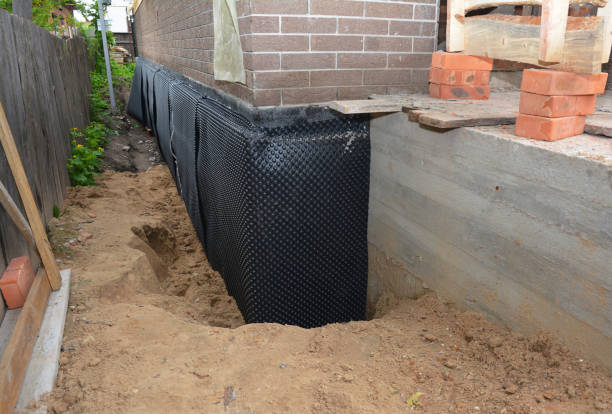 Happy homeowners after waterproofing job in Brookpark